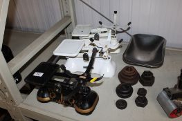 Three sets of scales and various weights