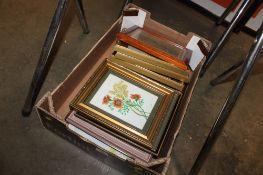 A box of various pictures and prints