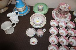 A collection of Poole pottery items and a Burleighware green glazed fruit bowl