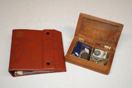 A carved wooden box containing ancient Chinese coins, 1797 Cartwheel penny, various other coinage