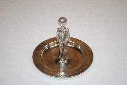 A silver plated dish decorated with a guardsman and engraved 'Presented to RSMA G.Mason, November