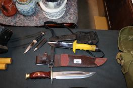 A hunter's knife and scabbard; a diver's knife and scabbard and a Sgian Dubh. This item can only