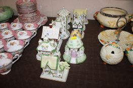 A quantity of Coalport cottages