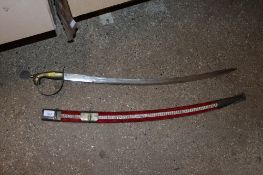 An Eastern sabre with scabbard. This item can only be purchased by someone over the age of 18 and ID