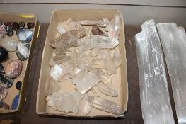 A box of mostly clear quartz crystal etc.