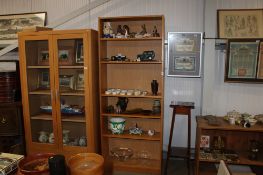 A modern oak effect open fronted bookcase