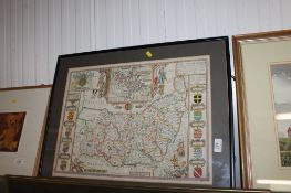 A framed and glazed coloured map depicting Suffolk