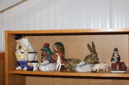 A collection of various decorative ornaments; a novelty teapot, wooden ornament in the form of a