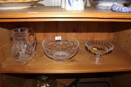 A Waterford cut glass bowl on stand; a heavy cut glass jug and a Stuart bowl