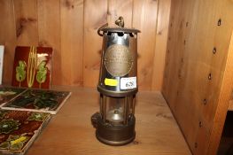 A The Protector Lamp and Lighting miners lamp