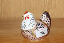 A Royal Crown Derby ornament in the form of a chicken