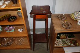 A mahogany inlaid two tier pot stand
