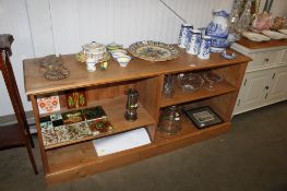 A modern pine open fronted shelving unit