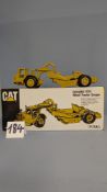 An ERTL COMPANY 1:50 Caterpillar 631E Wheel Tractor Scraper. Precision Die-Cast Model. S/N: 0577F