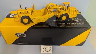 A CCM 1:48 CAT 637E Wheel Tractor-Scraper. Precision Die-Cast Model with original box. 2012. (102)