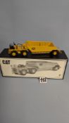 A CCM 1:87 CAT 776 with Mega Trailer. Precision All Brass Model. S/N: 062/212 with original box &