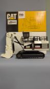 A NZG 1:50 CAT 5130 Hydraulic Shovel (White). Art No. 391/1 with original box. 2000. (114)