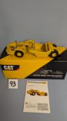 A CCM 1:48 CAT 631E Wheel Tractor-Scraper. Precision Die-Cast Model with original box & manual.