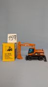 A NZG 1:50 CAT M318 Wheeled Excavator. Art No. 405 with original box. 2000. (159)