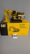 A NZG 1:50 CAT 5130B Mass Excavator. Official Launch Edition. S/N: 391/1 with original box.1997. (