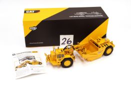 A CCM 1:48 CAT 65BK Wheel Tractor Scraper. Precision Die-Cast Model. S/N: 782/850 with original