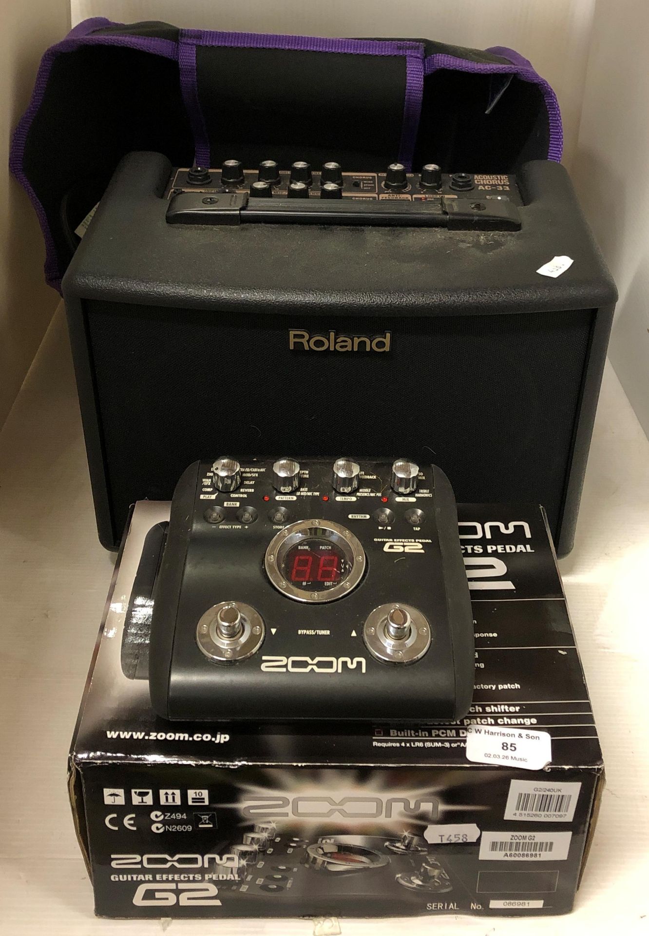 A Zoom G2 Guitar multi-effect pedal,