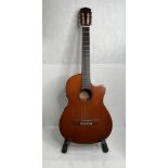 A Fender 2100cx acoustic-electric guitar,