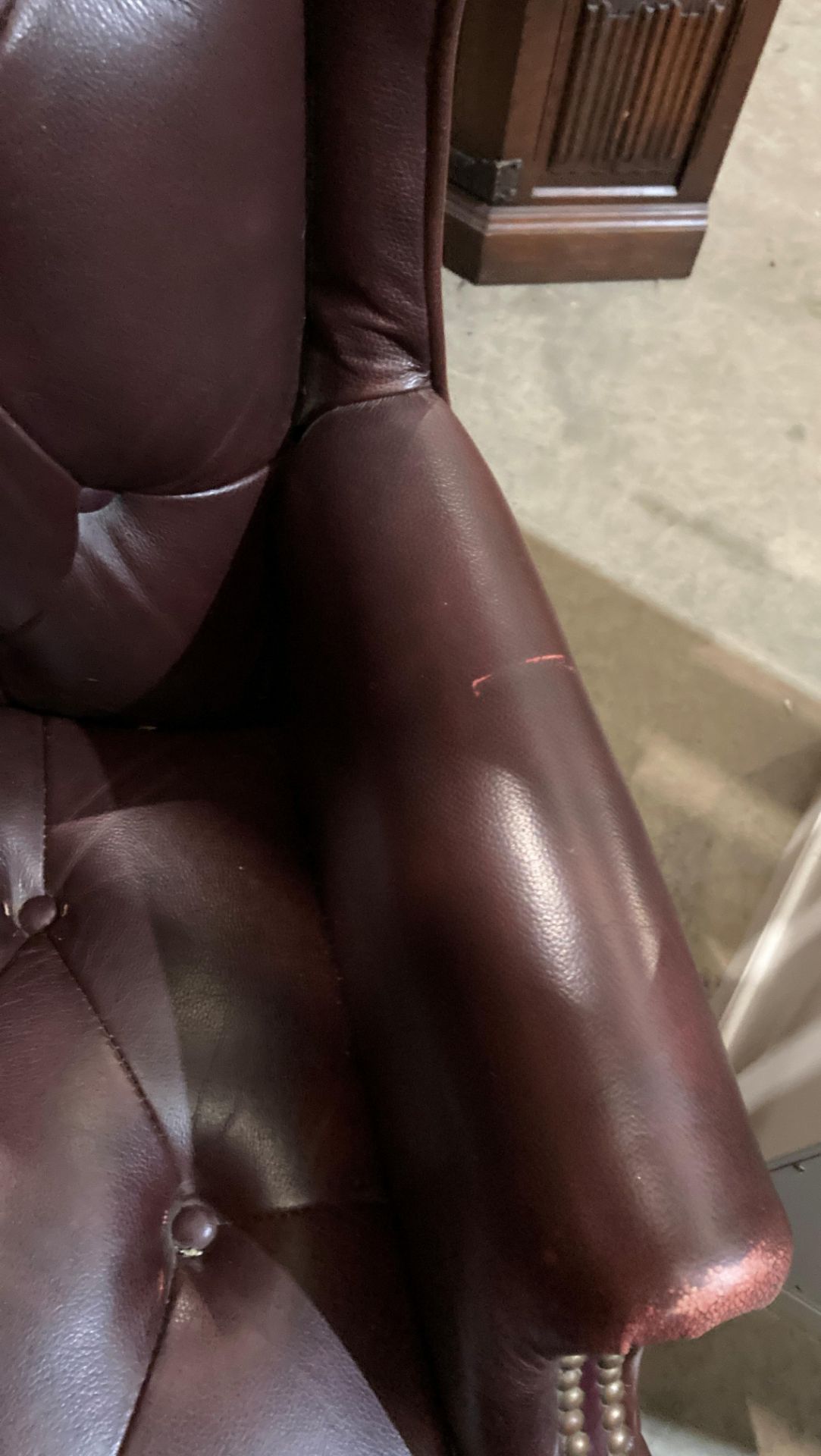 A brown leather high deep buttoned back and seat swivel armchair - please note: slight tear to arms, - Image 3 of 5