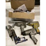 Seven assorted pneumatic tools including air compressor kit, three wrenches,