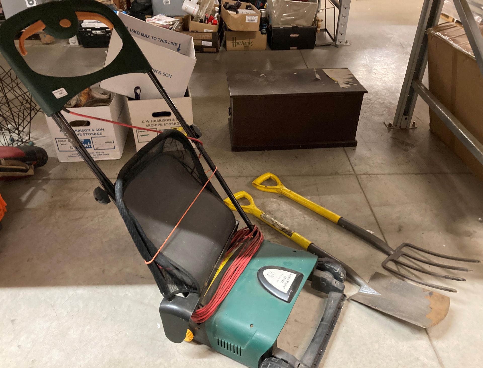 Three items - a Lawn Rake 400w 240v lawn rake, together with a spade ...