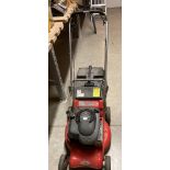 A Rover ES/XL petrol rotary lawnmower with Briggs & Stratton Quantum 50 XLS engine and collection