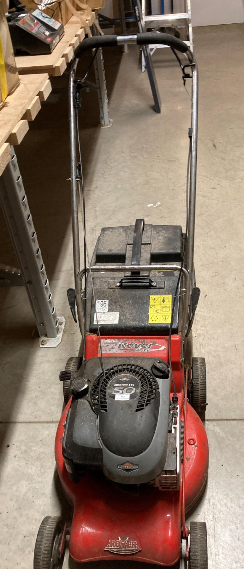 A Rover ES/XL petrol rotary lawnmower with Briggs & Stratton Quantum 50 XLS engine and collection
