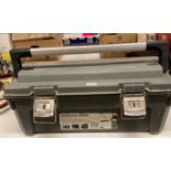 A tool box containing a Bosch GHO15-82 professional hand-held electric planer (240v),