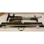 Four items - foot pump, baseball bat, tennis racquet,
