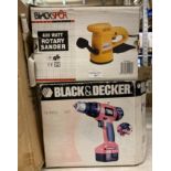 Two boxed items; a Black Spur 400 watt rotary sander,