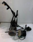 A Powakaddy Freeway Titanium electric golf trolley complete with battery and charger (CWH Ref: PO)