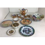 Fourteen Japanese ceramic items including scalloped edged flower decorated bowl 21cm diameter,