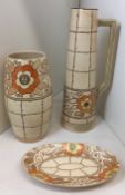 Three pieces of Charlotte Rhead Trellis Pattern Bursley Ware including jug 34cm high,