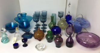 Twenty plus pieces of glassware including moulded amber glass fish decorated perfume bottle