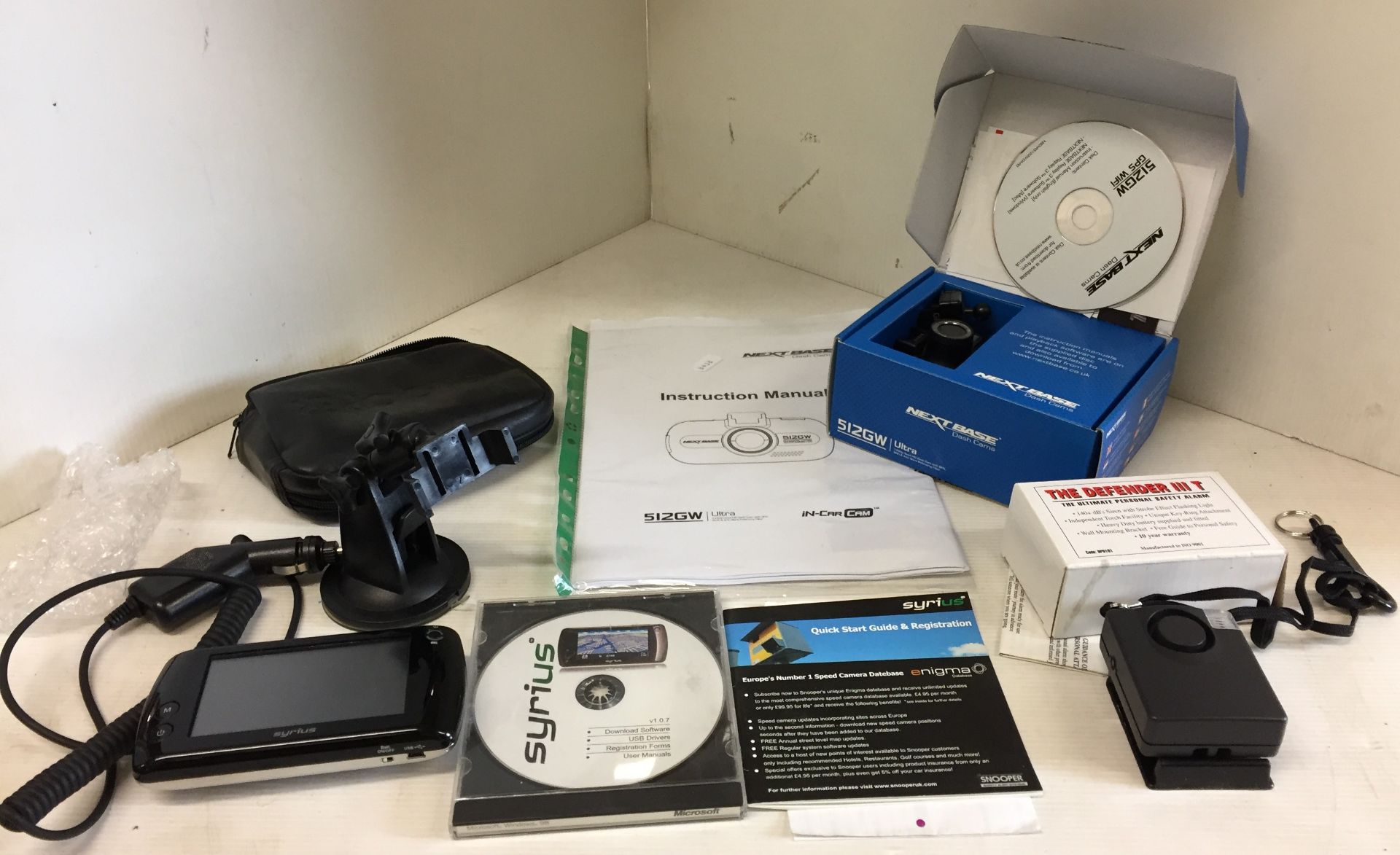 Three items including Snooper Syrius 500 Satnav with case, CD, instructions, mount and car charger,