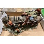 A large Capodimonte porcelain model of a drunken man on a cart with donkey and young boy,