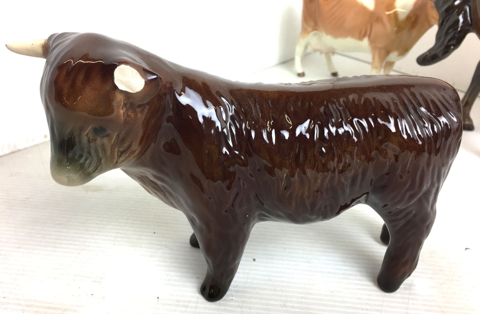 Four items including three Beswick animals including bay prancing stallion19cm high (repair to - Image 12 of 14