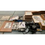 Seven small light oak picture frames, three small pencil sketches, print of a tawny owl,