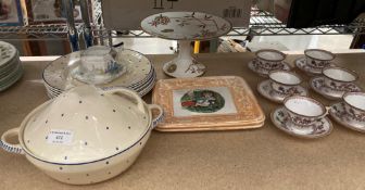 Contents to part of shelf; cream and blue spot tureen and dinner plates,