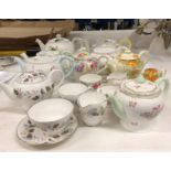 Nine Shelley teapots together with sugar bowls and creamers (CWH Ref: U03) Further
