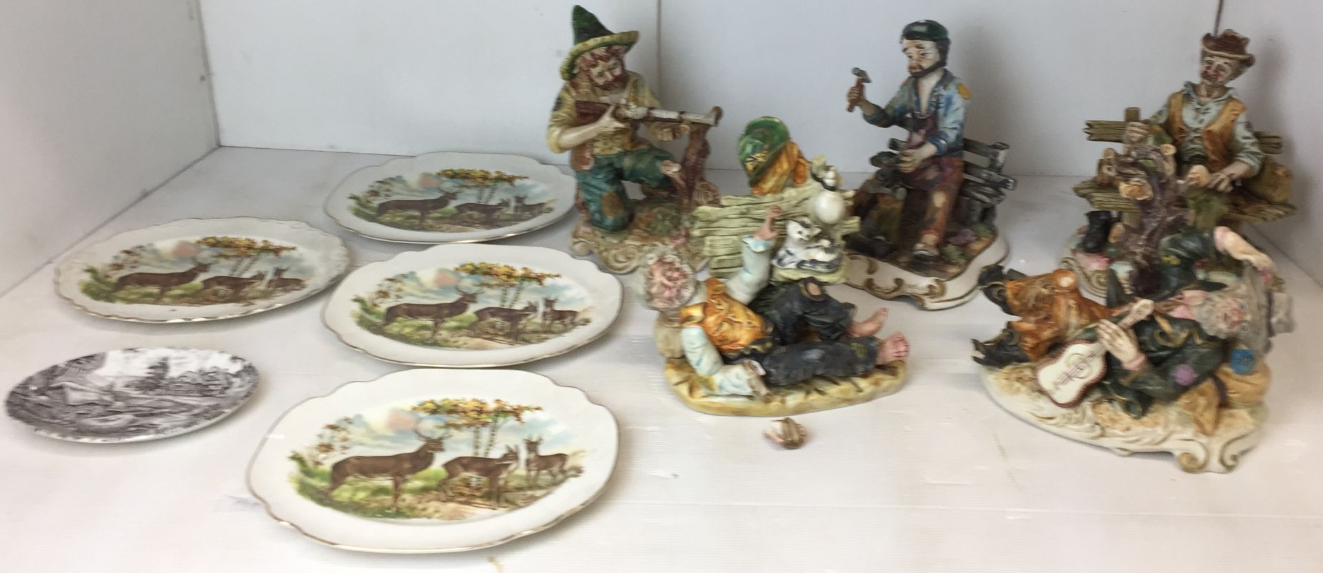 Ten ceramic items including five Capo de Monte figurines from 23 to 28cm high - noticed man with