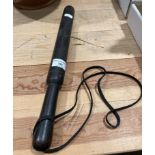 A hardwood truncheon,