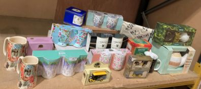 Contents to part of rack - a collection of Ringtons tea related items including boxed mugs, jugs,