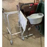 Five pieces of mobility equipment including a Buckingham grey plastic caddy,