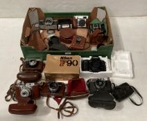 Eleven assorted cameras, lenses, and filters by Nikon F90, Aires Viscount, Voightlander Vitoret,